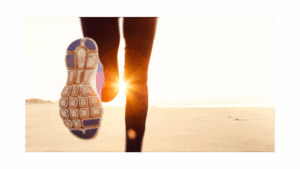 Picture of a jogger's legs with sun shing between them. Wabi-Sabi Pilates - North Boulder, Colorado