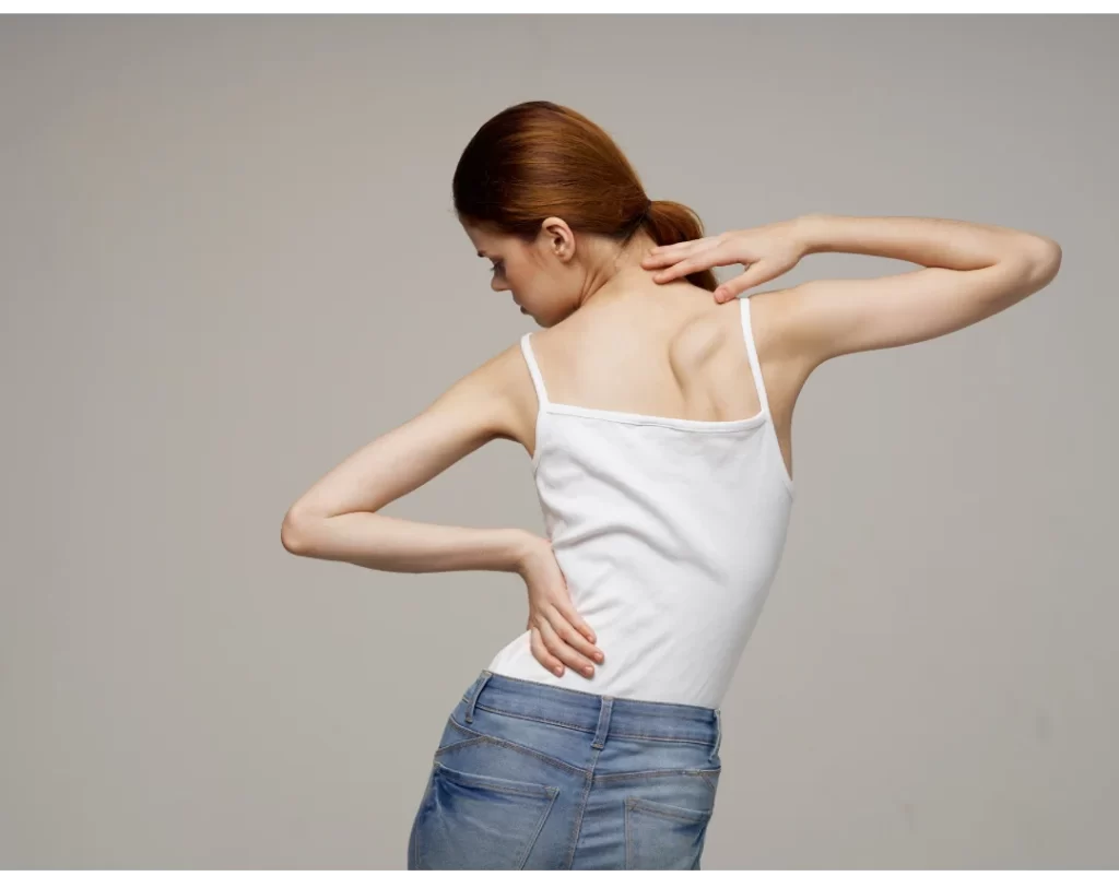 Picture of girl flexing her shoulder blades.