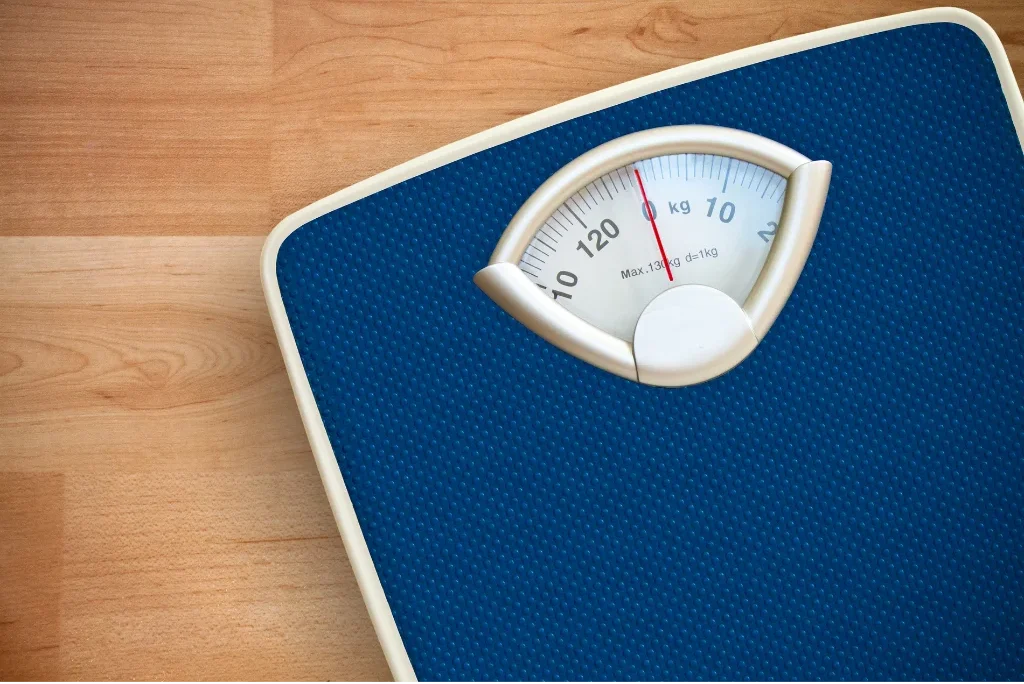 Picure of a Scale implying Pilates will help one lose weight at PIlates in Boulder, Colorado