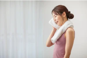 Woman tired after a Pilates reformer class in Boulder, colorado